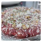 Carpaccio of retinto, meat from a native breed of Extremadura, nuts vinaigrette and parmesan